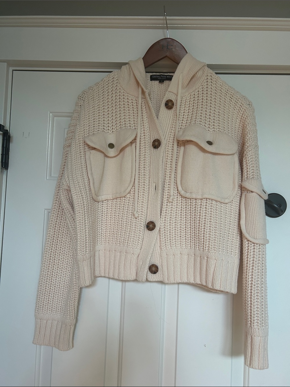 Central Park West Cream Hooded Chunky Knit Cardigan with Flap Pockets